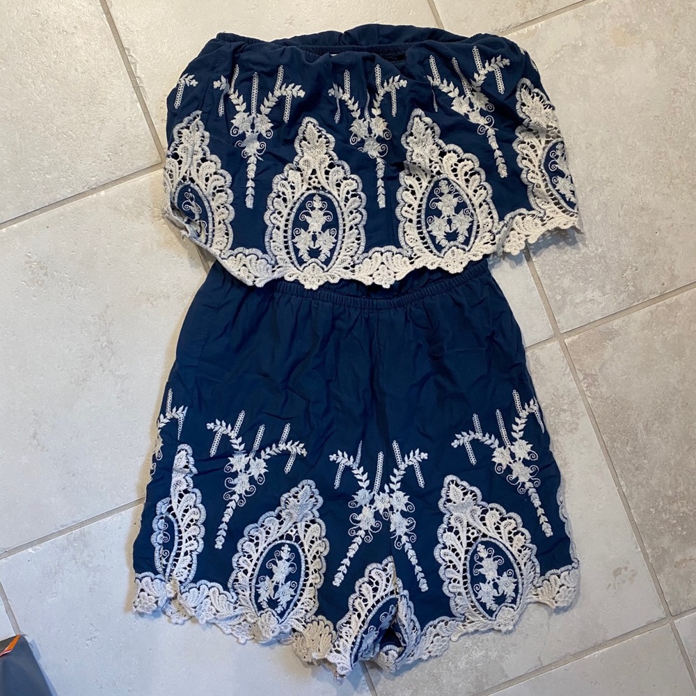 Navy romper from Francesca’s Boutique. Size S.